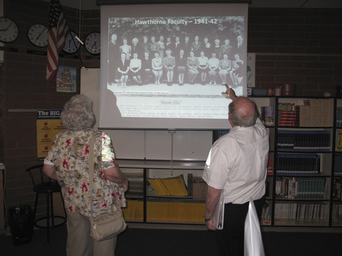Brennan Smith  |  The Salt Lake Tribune
Kay Parker and Dick Taggart view a slideshow of historic photos for the Hawthorne Elementary School's centennial celebration.